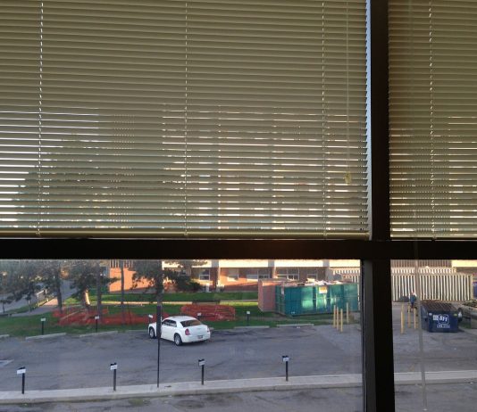 Retractable roller blinds