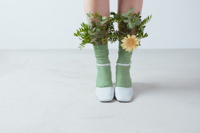 leaves-and-a-flower-on-a-person-s-socks