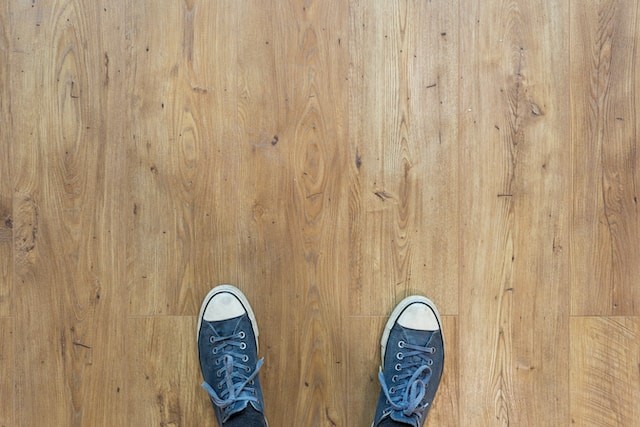 person on wooden floor