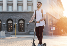 person riding on iscooter