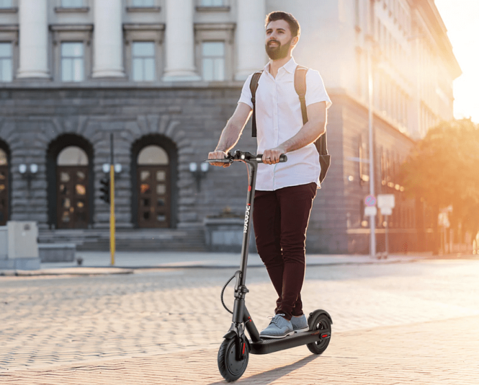 person riding on iscooter